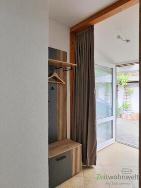 Hauseingang und Garderobe - 