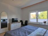 TV im hinteren Schlafzimmer - 