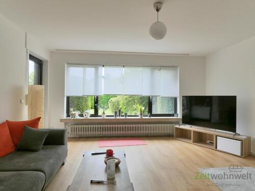 Blick ins Wohnzimmer - (EF1294_M) Kassel-Stadt: Harleshausen, geschmackvoll möblierte Wohnung mit Terrasse, PKW-Stellplatz und Service