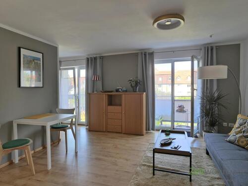Blick ins Wohnzimmer - (EF0536_M) Erfurt: Ilversgehofen, neu möblierte 2-Zimmer-Wohnung mit Balkon in der Tiergartensiedlung