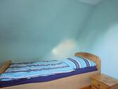 Bett im Schlafzimmer - 