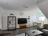 Blick ins Wohnzimmer - 2 Zimmer Etagenwohnung zur Miete in Kassel