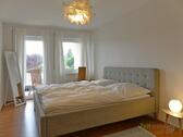 Schlafzimmer mit Balkonausgang - 
