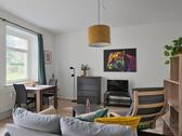 Esstisch und TV - 1 Zimmer Etagenwohnung zur Miete in Chemnitz