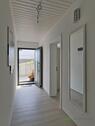 Hauseingang und Wohnungsflur - 