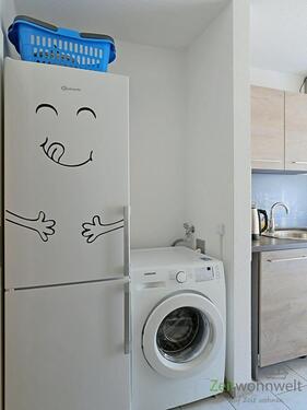 Waschmaschine in der Küche - 
