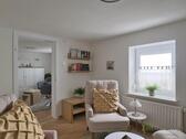 Blick zum vorderen Wohnzimmerbereich - 2 Zimmer Etagenwohnung zur Miete in Großenlüder