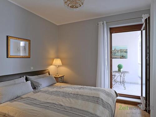Schlafzimmer mit Balkon - 