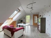 Blick zu TV und Balkonausgang - 2 Zimmer Etagenwohnung zur Miete in Gerstungen