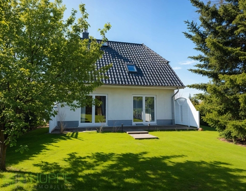 Sommeransicht 1 (KI generiert) - Mahlsdorf - Topgepflegtes Einfamilienhaus mit einmaligem Parkblick