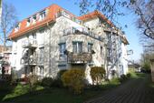 Hausansicht Südseite - Vermietete Eigentumswohnung mit Stellplatz in ansprechender Wohngegend!