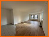 Wohnzimmer/Küche - Erstbezug nach Modernisierung mit Tiefgarage im Zentrum von Gera!