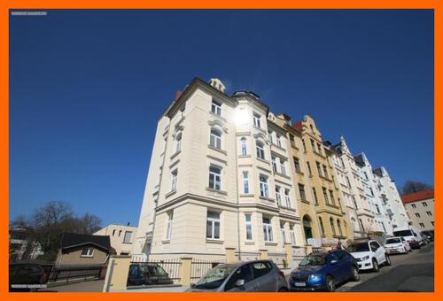 Ansicht - Blick über die Stadt! Gemütliche 3 Raum DG Wohnung mit großem Mietergarten.