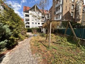 Gemeinschaftlicher Garten hinter dem Haus - 