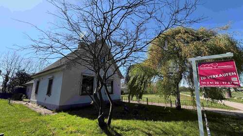 Foto - Haus zum Kaufen in Moorrege 419.000,00 € 80 m²