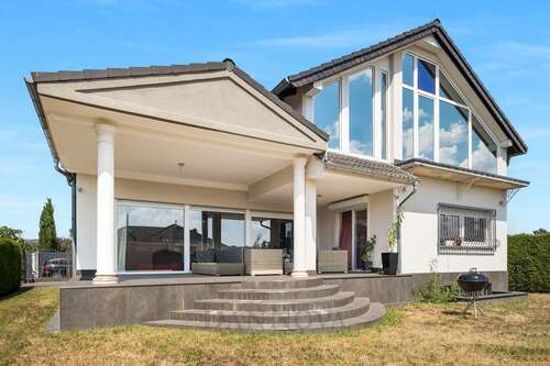 Foto - Haus zum Kaufen in Heusenstamm 1.290.000,00 € 250 m²