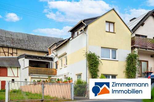 Foto - Haus zum Kaufen in Singhofen 149.000,00 € 138 m²