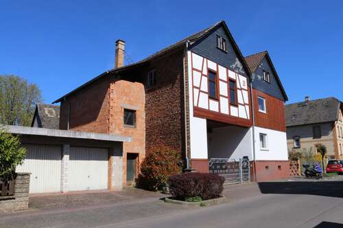 Foto - Haus zum Kaufen in Fernwald 369.000,00 € 144 m²