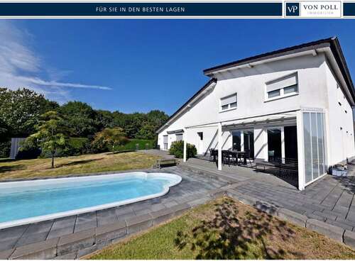 Foto - Haus zum Kaufen in Niedernwöhren 879.000,00 € 263 m²