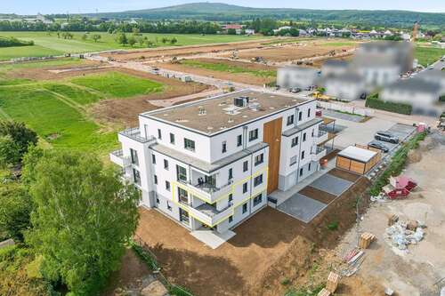 Foto - Wohnung zum Kaufen in Ober-Mörlen 291.500,00 € 54.72 m²