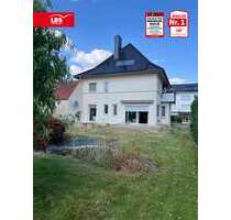 Haus zum Kaufen in Spenge 220.000,00 € 180 m²
