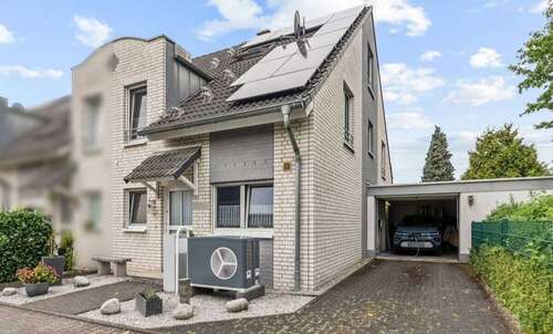 Foto - Haus zum Kaufen in Langenfeld 660.000,00 € 129.23 m²