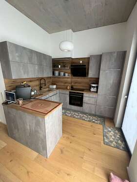 Foto - Wohnung zum Kaufen in Kirchheim 615.000,00 € 102.86 m²