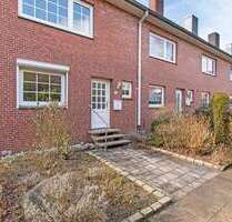 Haus zum Kaufen in Henstedt-Ulzburg 390.000,00 € 135.94 m²