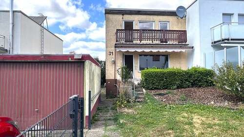 Foto - Haus zum Kaufen in Karben-Petterweil 375.000,00 € 120 m²