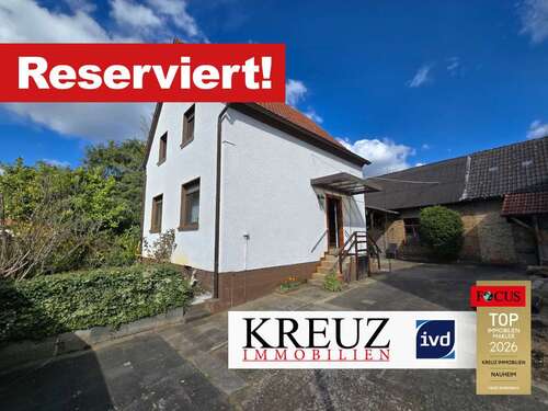 Foto - Haus zum Kaufen in Rüsselsheim Königstädten 367.500,00 € 95 m²