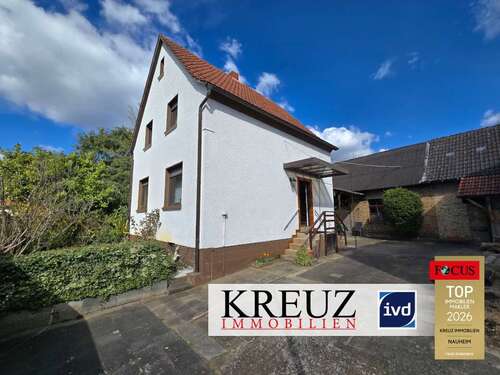 Foto - Haus zum Kaufen in Rüsselsheim Königstädten 367.500,00 € 95 m²