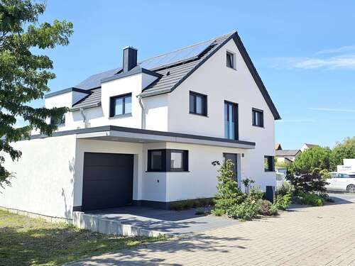 Foto - Haus zum Kaufen in Römerberg 1.048.000,00 € 200 m²