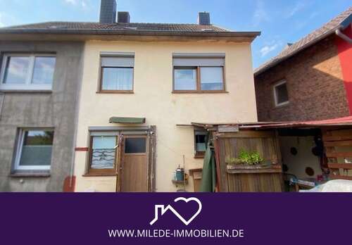 Foto - Haus zum Kaufen in Übach-Palenberg Scherpenseel 115.000,00 € 107 m²