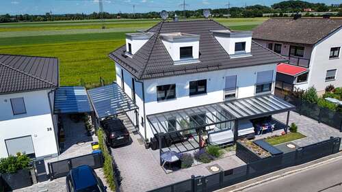 Foto - Haus zum Kaufen in Karlsfeld 1.379.000,00 € 146.4 m²
