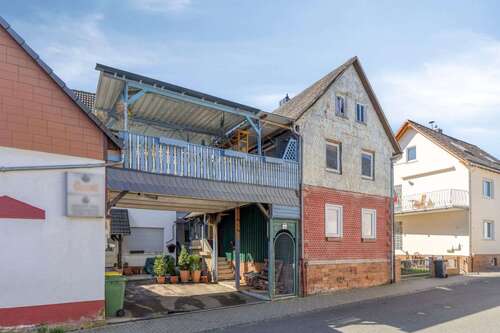 Foto - Haus zum Kaufen in Lollar 299.000,00 € 308 m²