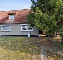 Haus zum Kaufen in Leegebruch 230.000,00 € 133.48 m²