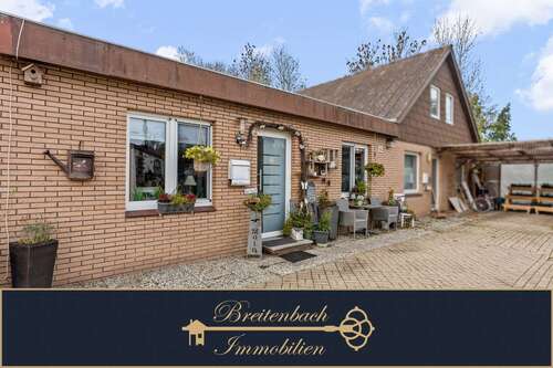 Foto - Haus zum Kaufen in Butjadingen 160.000,00 € 97.88 m²