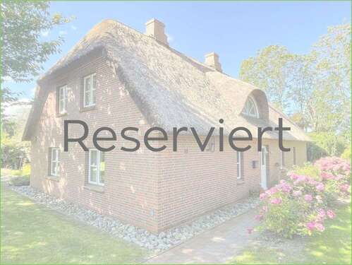 Foto - Haus zum Kaufen in Tetenbüll Wasserkoog 495.000,00 € 174 m²