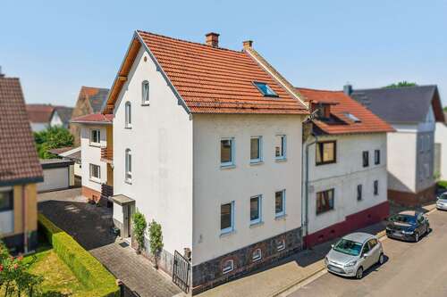 Foto - Haus zum Kaufen in Fernwald 325.000,00 € 160 m²