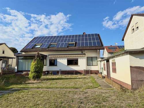 Foto - Haus zum Kaufen in Bürstadt 485.000,00 € 159.71 m²