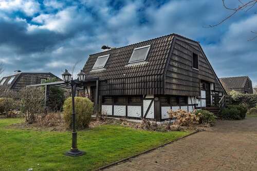 Foto - Haus zum Kaufen in Butjadingen 219.000,00 € 67 m²