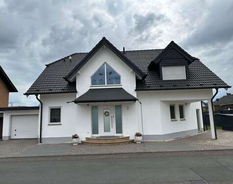 Foto - Haus zum Kaufen in Niederkassel 910.000,00 € 230 m²