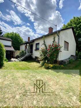 Foto - Haus zum Kaufen in Frankfurt am Main Nieder-Erlenbach 1.290.000,00 € 345.45 m²