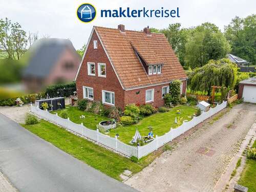 Foto - Haus zum Kaufen in Wangerland 229.000,00 € 124.54 m²