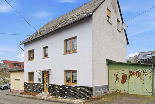 Foto - Haus zum Kaufen in Dachsenhausen 105.000,00 € 136 m²