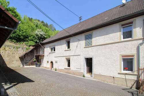 Foto - Haus zum Kaufen in Jeckenbach 179.000,00 € 190.01 m²