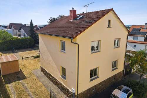 Foto - Haus zum Kaufen in Ober-Mörlen 439.000,00 € 179 m²