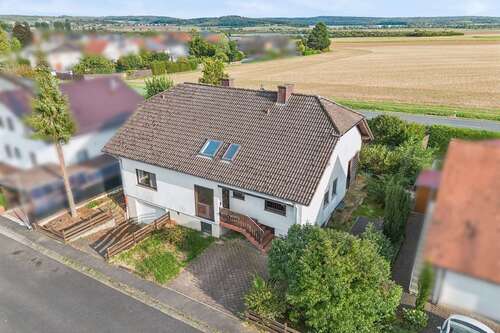 Foto - Haus zum Kaufen in Hungen-Utphe 299.000,00 € 210 m²
