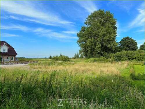 Foto - Grundstück zu verkaufen in Tetenbüll 165.000,00 € 815 m²