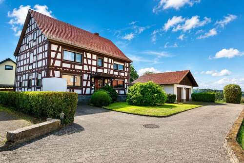 Foto - Haus zum Kaufen in Romrod Ober-Breidenbach 279.000,00 € 200 m²